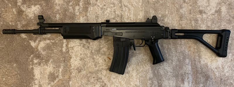 Gail-with-AR15-magazine-adapter-left.jpg